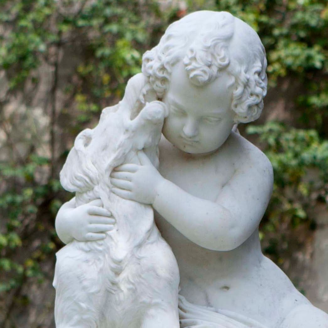 Sculpture enfant chien parc romantique montresor
